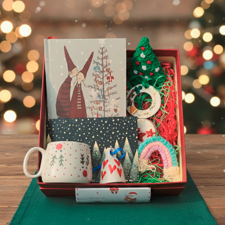 3 more items in the box: bell, notecard and fridge magnet